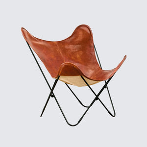 Side View of Butterfly Sling Chair in Cognac Leather