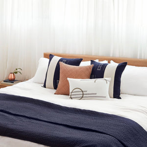 Indigo Pillows on Bed
