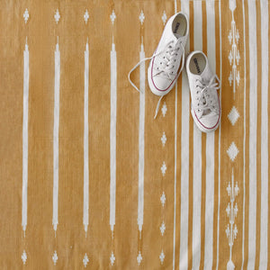 Overhead View of Yellow Striped Dhurrie Rug