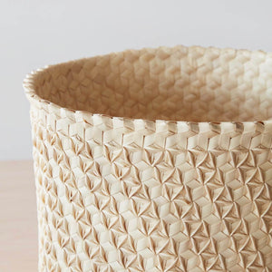 large woven palm basket closeup