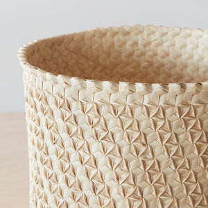 small woven palm basket closeup