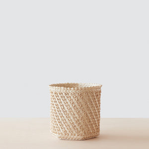 small woven palm basket